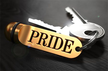 simsearch:400-08289045,k - Keys and Golden Keyring with the Word Pride over Black Wooden Table with Blur Effect. Stock Photo - Budget Royalty-Free & Subscription, Code: 400-08284443