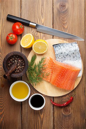 simsearch:400-08187570,k - Salmon, spices and condiments on wooden table. Top view Stockbilder - Microstock & Abonnement, Bildnummer: 400-08284667