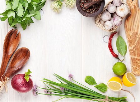simsearch:400-07578178,k - Fresh herbs and spices on wooden table. Top view with copy space Stock Photo - Budget Royalty-Free & Subscription, Code: 400-08284749