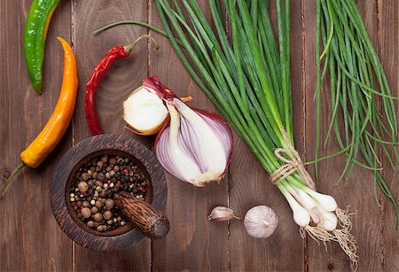 simsearch:400-04689367,k - Fresh garden herbs and spices over wooden table. Top view Stock Photo - Budget Royalty-Free & Subscription, Code: 400-08284759