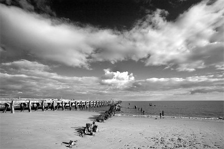 simsearch:400-06638821,k - Black and white image of the harbour wall and groyne on Walberswick beach Suffolk, England Stock Photo - Budget Royalty-Free & Subscription, Code: 400-08284985