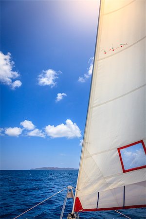 Jib sail in the bow of a sailboat at sea in British Virgin Islands Stock Photo - Budget Royalty-Free & Subscription, Code: 400-08285241