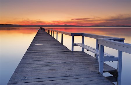 simsearch:400-07514503,k - After sunset at Long Jetty, fiery red clouds and reflections in Tuggerah Lake, Central Coast NSW, Australia Stock Photo - Budget Royalty-Free & Subscription, Code: 400-08285391