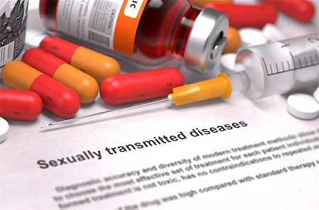 simsearch:400-08341383,k - Sexually Transmitted Diseases - Printed Diagnosis with Red Pills, Injections and Syringe. Medical Concept with Selective Focus. Stock Photo - Budget Royalty-Free & Subscription, Code: 400-08285739