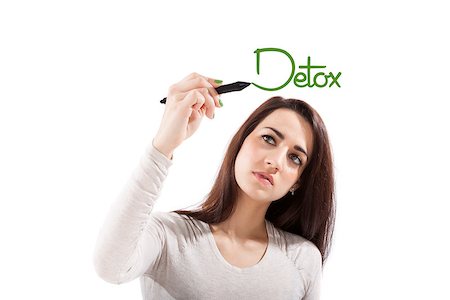 Beautiful healthy girl writing with black marker pen on virtual screen the world detox. Young health professional isolated on white background. Stock Photo - Budget Royalty-Free & Subscription, Code: 400-08286232