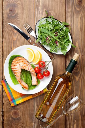 simsearch:400-05295567,k - Grilled salmon and white wine on wooden table. Top view Stock Photo - Budget Royalty-Free & Subscription, Code: 400-08286445