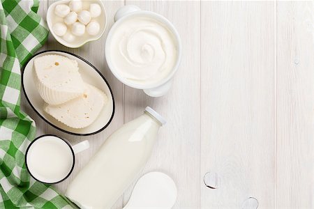 simsearch:400-08296754,k - Dairy products on wooden table. Sour cream, milk, cheese, yogurt and butter. Top view with copy space Stock Photo - Budget Royalty-Free & Subscription, Code: 400-08286479