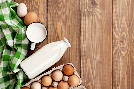simsearch:400-08296754,k - Dairy products on wooden table. Milk and eggs. Top view with copy space Stock Photo - Budget Royalty-Free & Subscription, Code: 400-08286481
