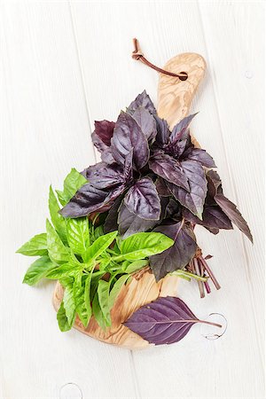 simsearch:400-07578178,k - Fresh garden basil on cutting board. Top view Stock Photo - Budget Royalty-Free & Subscription, Code: 400-08286528