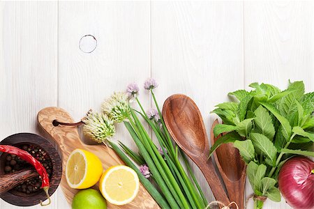 simsearch:400-07578178,k - Fresh herbs and spices on wooden table. Top view with copy space Stock Photo - Budget Royalty-Free & Subscription, Code: 400-08286521