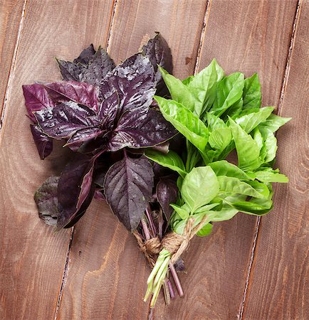 simsearch:400-07578178,k - Fresh garden basil herbs on wooden table. Top view Stock Photo - Budget Royalty-Free & Subscription, Code: 400-08286535