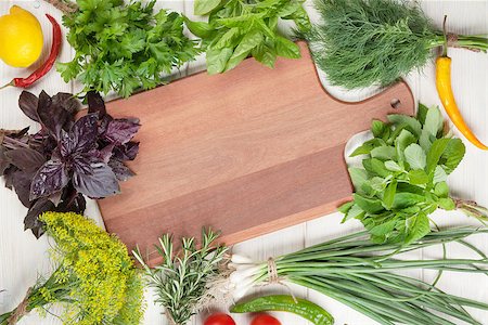 simsearch:400-07578178,k - Fresh garden herbs and spices on wooden table. Top view with copy space Stock Photo - Budget Royalty-Free & Subscription, Code: 400-08286531