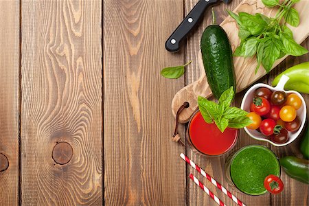 simsearch:400-07172598,k - Fresh vegetable smoothie on wooden table. Tomato, cucumber, pepper. Top view with copy space Stock Photo - Budget Royalty-Free & Subscription, Code: 400-08286595