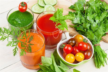 simsearch:400-07172598,k - Fresh vegetable smoothie on wooden table. Tomato, cucumber, carrot Stock Photo - Budget Royalty-Free & Subscription, Code: 400-08286601