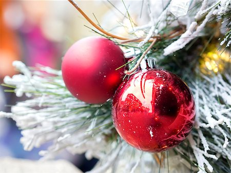 Picture of decorations with branches, snow and red Christmas balls on a Christmas market Stock Photo - Budget Royalty-Free & Subscription, Code: 400-08286684