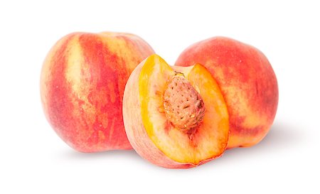 Two whole and half of peach isolated on white background Stock Photo - Budget Royalty-Free & Subscription, Code: 400-08286701