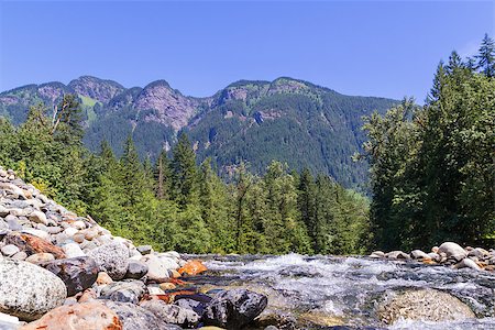 simsearch:400-04412215,k - landscape with mountains trees and a river in front Photographie de stock - Aubaine LD & Abonnement, Code: 400-08286703