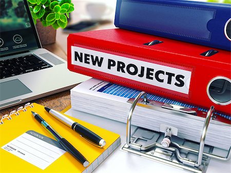 New Projects - Red Ring Binder on Office Desktop with Office Supplies and Modern Laptop. Business Concept on Blurred Background. Toned Illustration. Foto de stock - Super Valor sin royalties y Suscripción, Código: 400-08286930