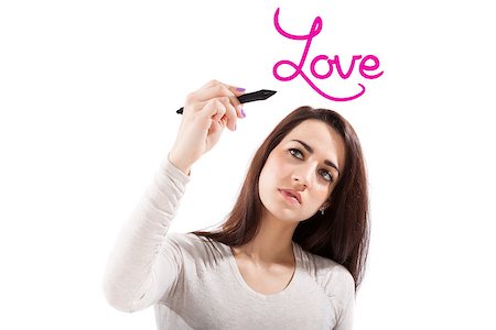 Beautiful healthy girl writing with black marker pen on virtual screen the world Love. Young beautiful girl isolated on white background. Stock Photo - Budget Royalty-Free & Subscription, Code: 400-08286989