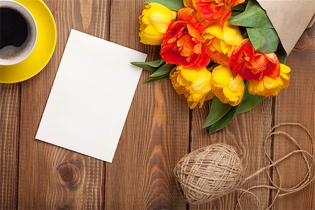 simsearch:400-07662543,k - Colorful tulips bouquet, blank greeting card and coffee cup on wooden table Stock Photo - Budget Royalty-Free & Subscription, Code: 400-08287269