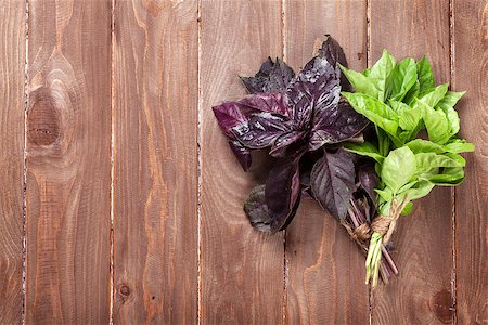 simsearch:400-07578178,k - Fresh garden basil herbs on wooden table. Top view Stock Photo - Budget Royalty-Free & Subscription, Code: 400-08287310