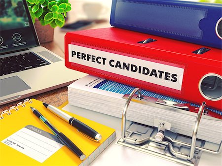 simsearch:400-05034438,k - Perfect Candidates - Red Office Folder on Background of Working Table with Stationery, Laptop and Reports. Business Concept on Blurred Background. Toned Image. Stock Photo - Budget Royalty-Free & Subscription, Code: 400-08287711