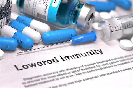 Diagnosis - Lowered Immunity. Medical Concept with Blue Pills, Injections and Syringe. Selective Focus. Blurred Background. Stock Photo - Budget Royalty-Free & Subscription, Code: 400-08288353