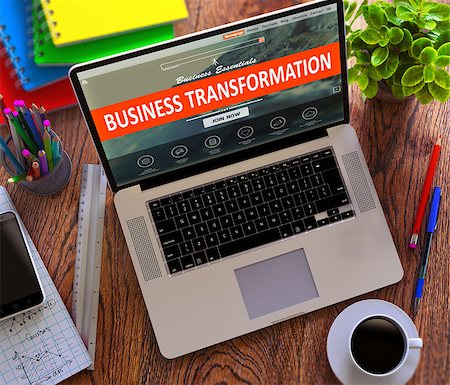 simsearch:400-08508160,k - Business Transformation Concept. Modern Laptop and Different Office Supply on Wooden Desktop background. Stockbilder - Microstock & Abonnement, Bildnummer: 400-08288395