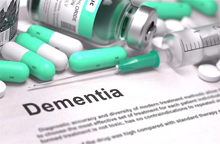 Dementia - Printed Diagnosis with Blurred Text. On Background of Medicaments Composition - Mint Green Pills, Injections and Syringe. Photographie de stock - Aubaine LD & Abonnement, Code: 400-08288430