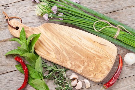 Fresh herbs and spices on wooden table. Top view with copy space Stock Photo - Budget Royalty-Free & Subscription, Code: 400-08288494