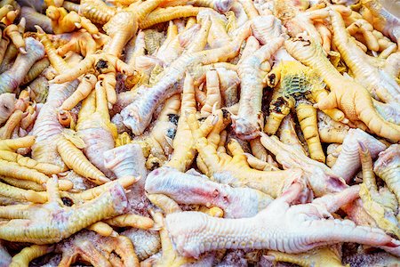 simsearch:400-04943721,k - Chicken feet for sale at a farmers market in Pyatigorsk, Russia Stock Photo - Budget Royalty-Free & Subscription, Code: 400-08288897