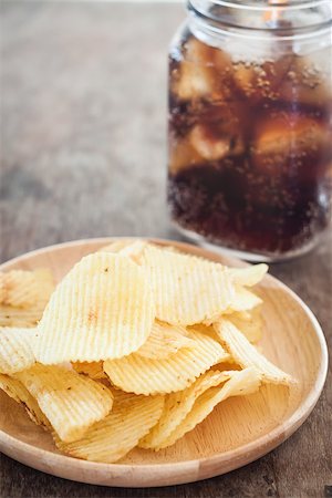 Crispy potato chips with iced cola, stock photo Stock Photo - Budget Royalty-Free & Subscription, Code: 400-08289044