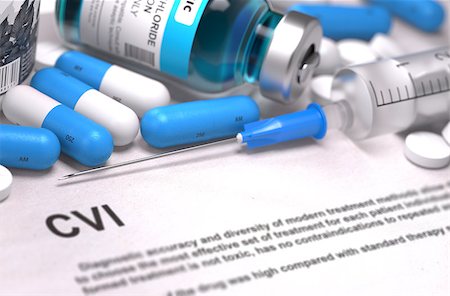 simsearch:400-08376875,k - Diagnosis - CVI - Cerebrovascular Insult. Medical Concept with Blue Pills, Injections and Syringe. Selective Focus. Blurred Background. Stock Photo - Budget Royalty-Free & Subscription, Code: 400-08289064