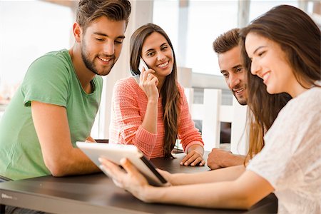 students campus phones - Group of friends meeting In the local Coffee Shop Stock Photo - Budget Royalty-Free & Subscription, Code: 400-08289230