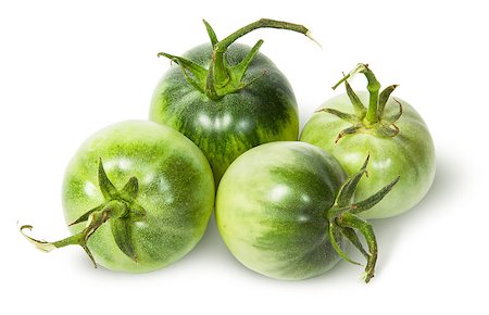 simsearch:400-06954534,k - Four green tomatoes near isolated on white background Stock Photo - Budget Royalty-Free & Subscription, Code: 400-08289294
