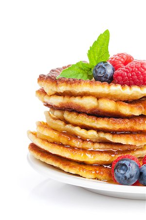 simsearch:400-09019412,k - Pancakes with raspberry, blueberry, mint and honey syrup. Isolated on white background Foto de stock - Super Valor sin royalties y Suscripción, Código: 400-08289466