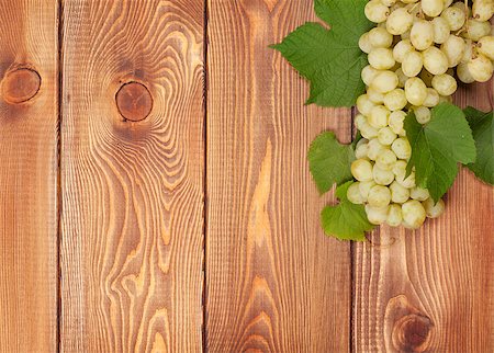 simsearch:400-08110621,k - Bunch of white grapes on wooden table background with copy space Stock Photo - Budget Royalty-Free & Subscription, Code: 400-08289470