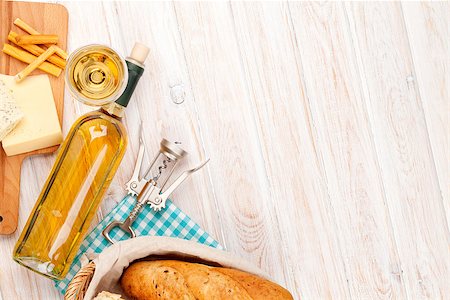 simsearch:400-08074810,k - White wine, cheese and bread on white wooden table background. Top view with copy space Photographie de stock - Aubaine LD & Abonnement, Code: 400-08289652