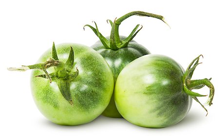 simsearch:400-06954534,k - Three green tomatoes near isolated on white background Stock Photo - Budget Royalty-Free & Subscription, Code: 400-08289704