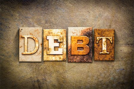debtor - The word "DEBT" written in rusty metal letterpress type on an old aged leather background. Stock Photo - Budget Royalty-Free & Subscription, Code: 400-08289942