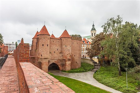 polish castle - The Warsaw Barbican is  part of historic fortifications around city. Now it is located between the Old and New Towns and is a major tourist attraction. Stock Photo - Budget Royalty-Free & Subscription, Code: 400-08282571