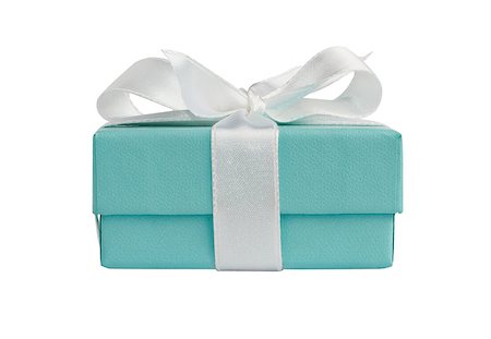 Side view of turquoise isolated gift box with white ribbon on white background with path Stock Photo - Budget Royalty-Free & Subscription, Code: 400-08282808