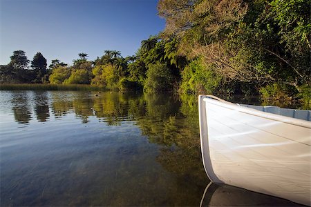 photoimage (artist) - Front of small wooden row boat, with reflections, Lake Rotorua, New Zealand Photographie de stock - Aubaine LD & Abonnement, Code: 400-08283205