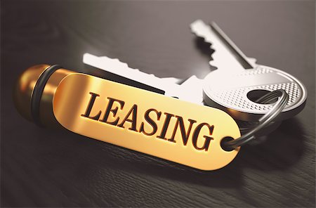 simsearch:400-08289045,k - Keys and Golden Keyring with the Word Leasing over Black Wooden Table with Blur Effect. Toned Image. Stock Photo - Budget Royalty-Free & Subscription, Code: 400-08283739