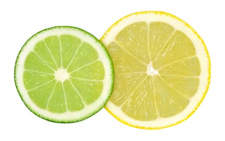 simsearch:400-03931888,k - Two cut rings lime and lemon isolated on a white background. Stock Photo - Budget Royalty-Free & Subscription, Code: 400-08283874