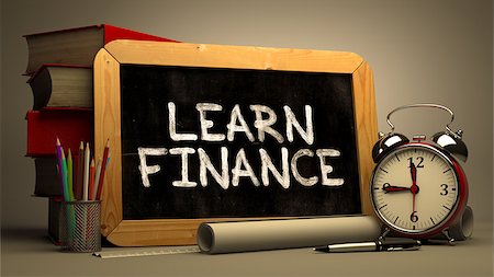 Handwritten Learn Finance on a Chalkboard. Composition with Chalkboard and Stack of Books, Alarm Clock and Rolls of Paper on Blurred Background. Toned Image. Stock Photo - Budget Royalty-Free & Subscription, Code: 400-08294239