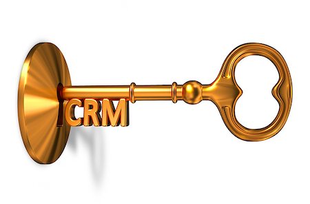simsearch:400-08283741,k - CRM - Customer Relationship Management - Golden Key is Inserted into the Keyhole Isolated on White Background Foto de stock - Super Valor sin royalties y Suscripción, Código: 400-08294256
