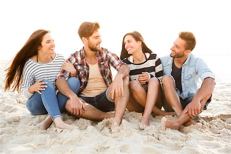 simsearch:400-08287050,k - Multicultural group of friends at the beach having fun Stock Photo - Budget Royalty-Free & Subscription, Code: 400-08294389