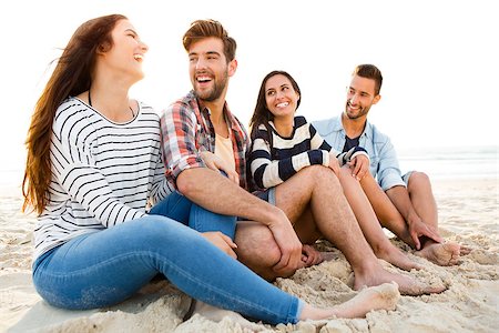 simsearch:400-08287050,k - Multicultural group of friends at the beach having fun Stock Photo - Budget Royalty-Free & Subscription, Code: 400-08294390