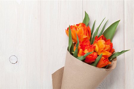 simsearch:400-08036453,k - Colorful tulips over wooden table background with copy space Stock Photo - Budget Royalty-Free & Subscription, Code: 400-08294937